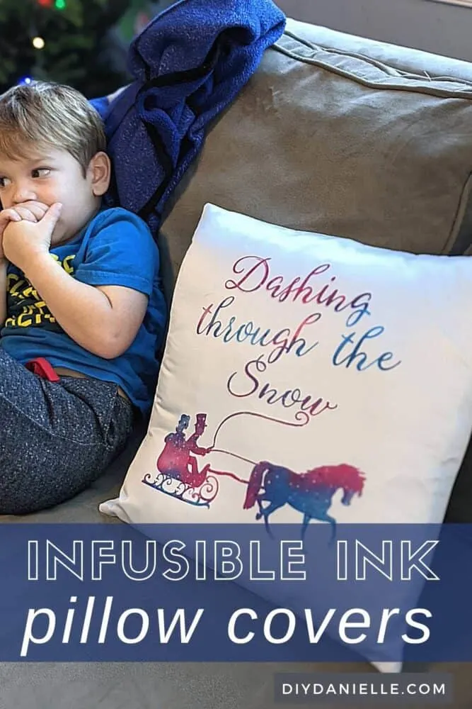 Easy pillow covers made with Cricut Infusible Ink: White pillow cover with "Dashing through the Snow" and a horse with carriage on it.