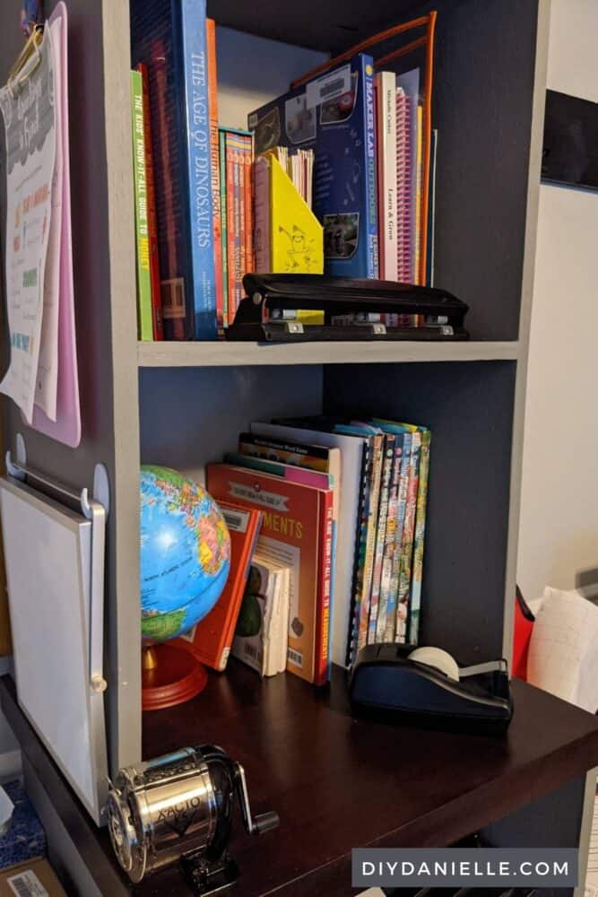Top portion of our DIY printer shelves. The top has room for a globe, pencil sharpener, and books.
