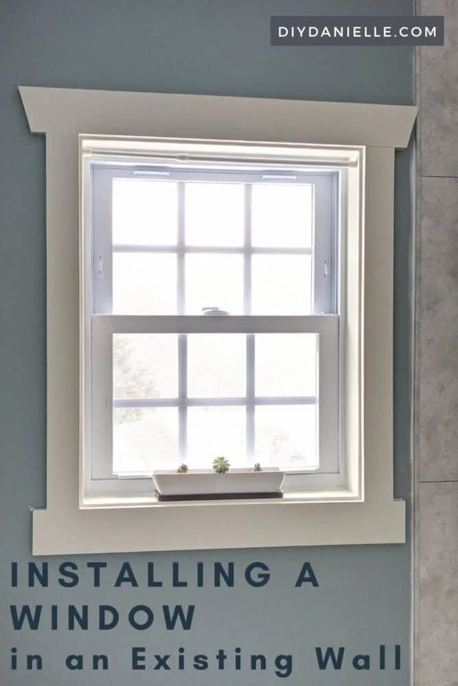 Finished window added to a small bathroom to allow natural light into the room. 