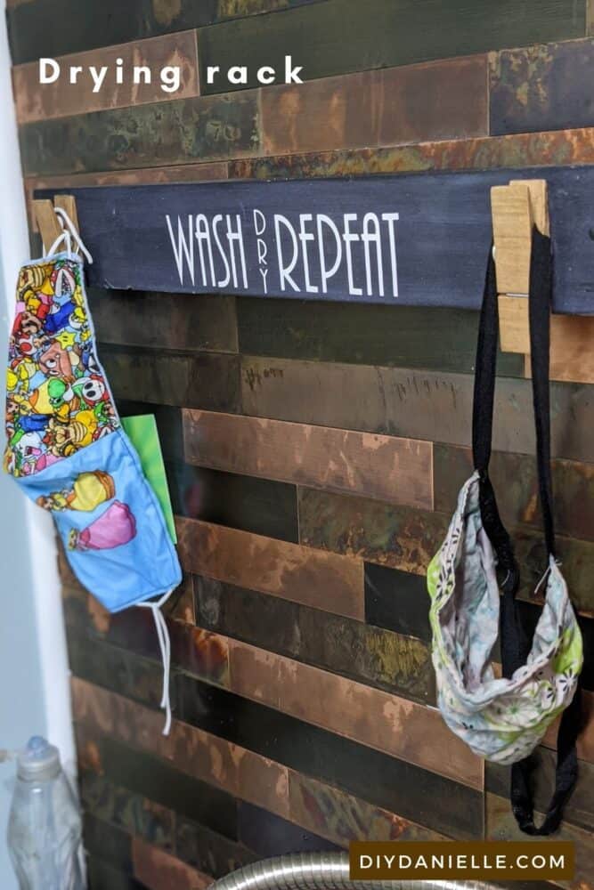 Drying rack for masks. We hand wash in the laundry sink, then hang dry above on this simple DIY rack.