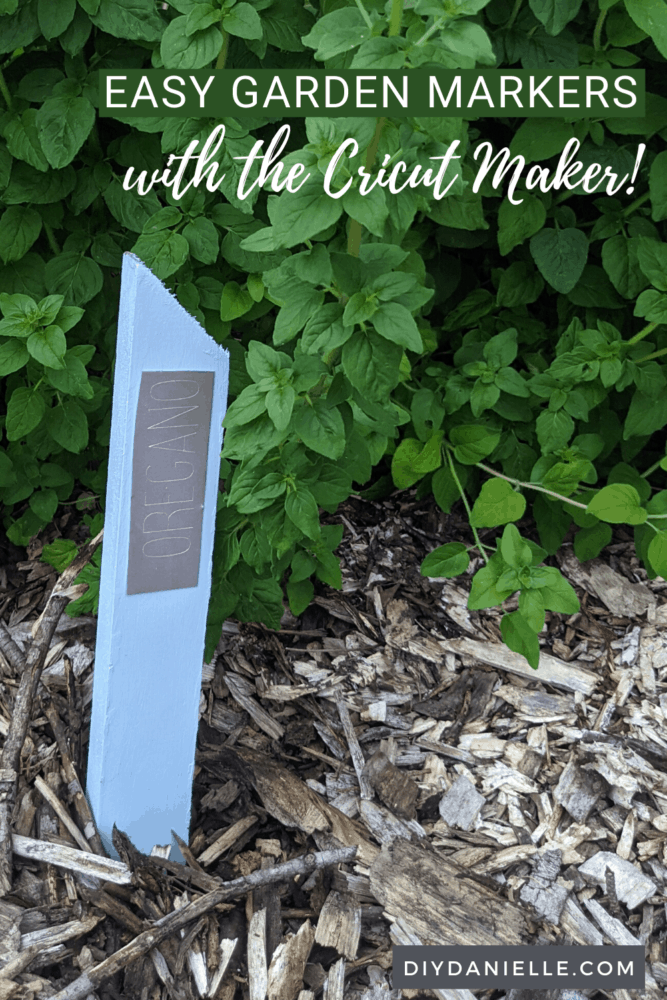 Easy Garden Markers with the Cricut Maker: Oregano plant marker in front of a large oregano plant.