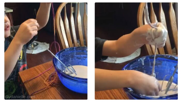 Soaking string, yarn, and lace in the paper mache paste.