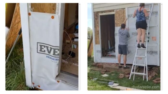 Installing house wrap on our shed.