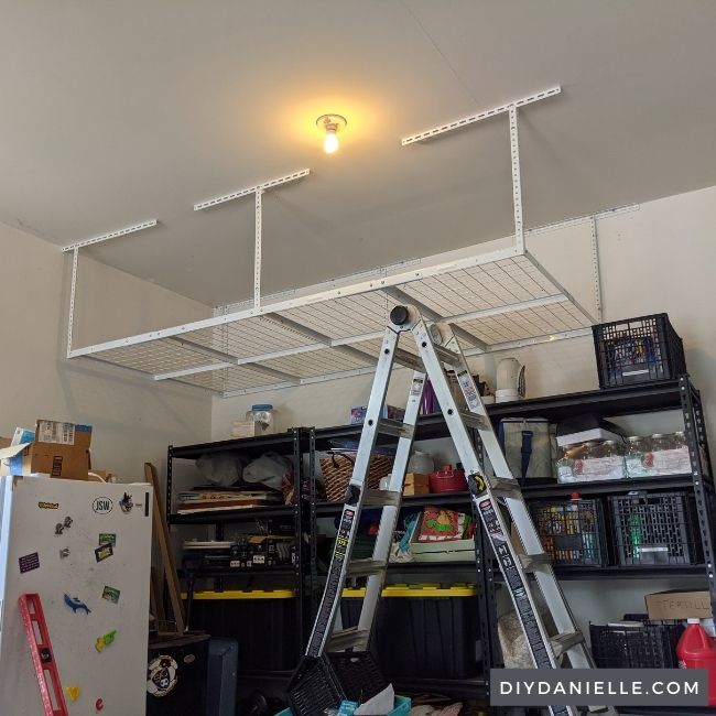 How to Install an Overhead Garage Storage Rack - DIY Danielle®