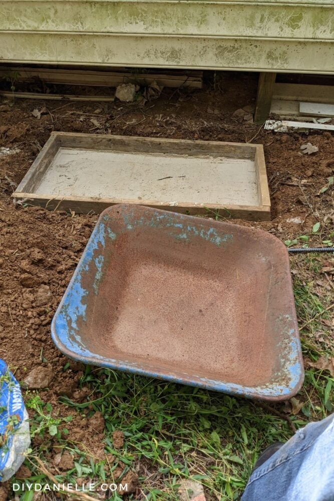 Sand tamped down inside the concrete form.