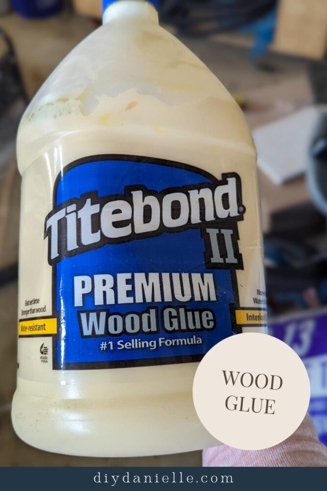 Large container of wood glue for woodworking projects.