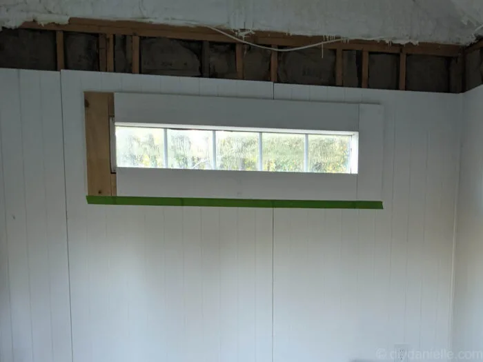 In this photo you can see three sides of the window covered with the trim. The left piece of trim hasn't been put on yet.