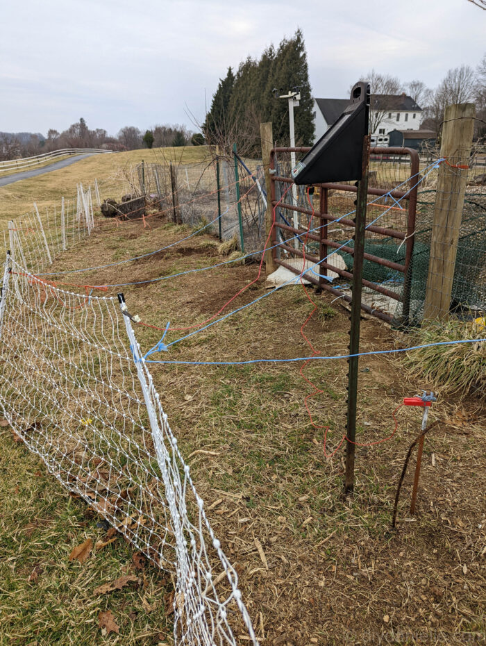 The fencing is further out near the gate to accommodate the gate opening and closing.