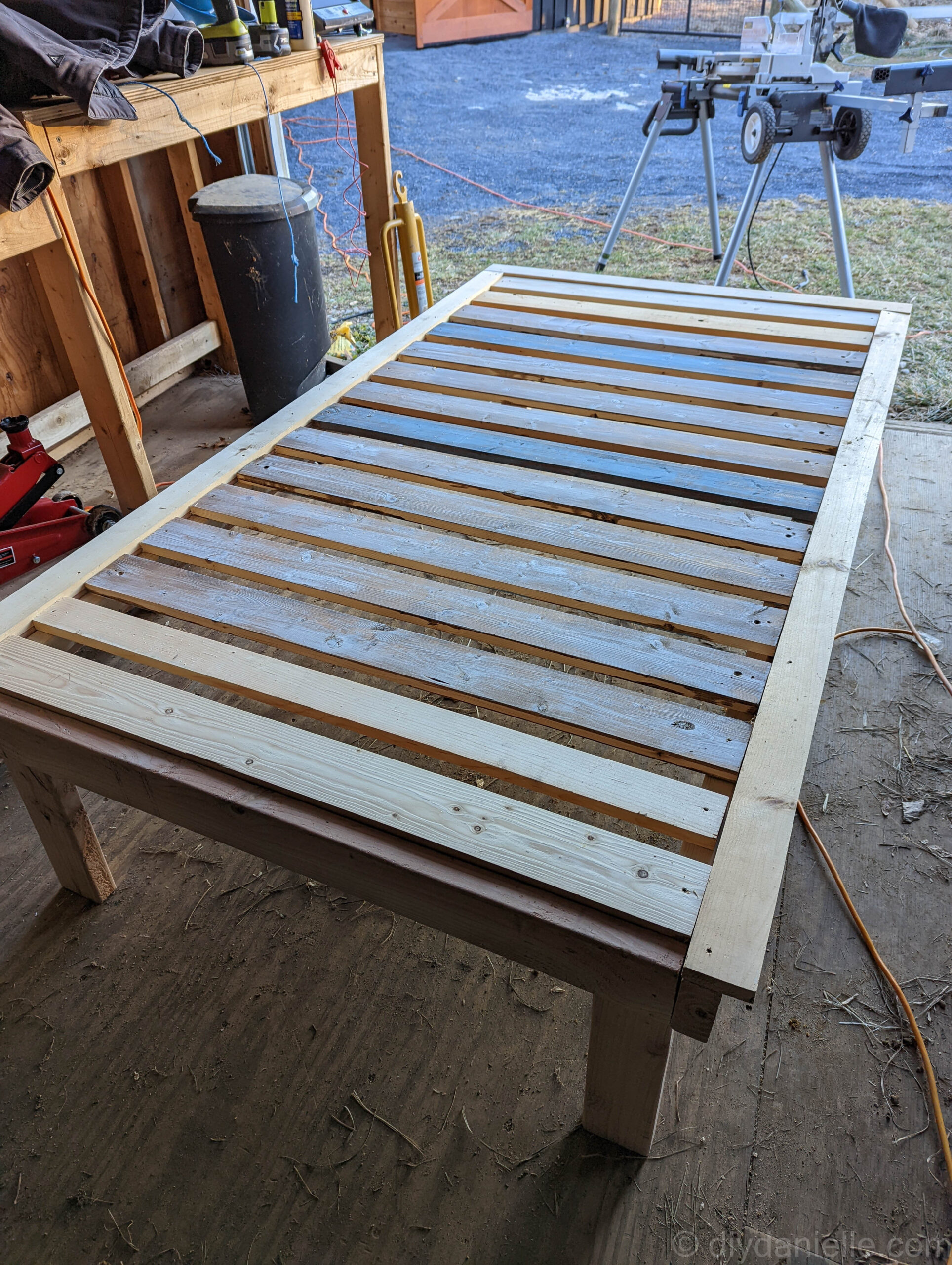 All of the slats attached to the twin platform bed.