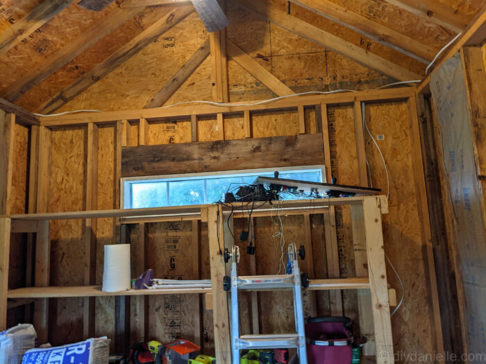 The triangle area above the main wall was difficult to insulate because the studs are laid flat so they don't create an easy bay to put insulation batts into. 