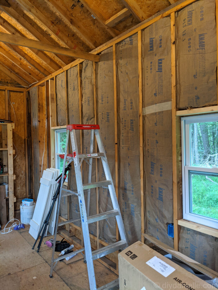 Shed wall, partially insulated with R-13 batts.