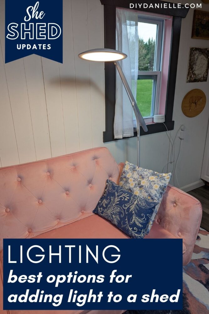 She Shed Lighting: Best Options for Adding Light to a Shed. Photo of a Cricut Bright Floor Lamp over a pink couch with two blue floral pillows.