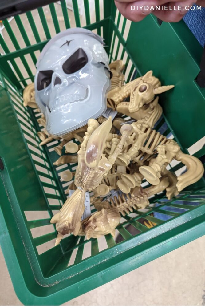 Ten unicorn skeletons in a Dollar Tree basket.