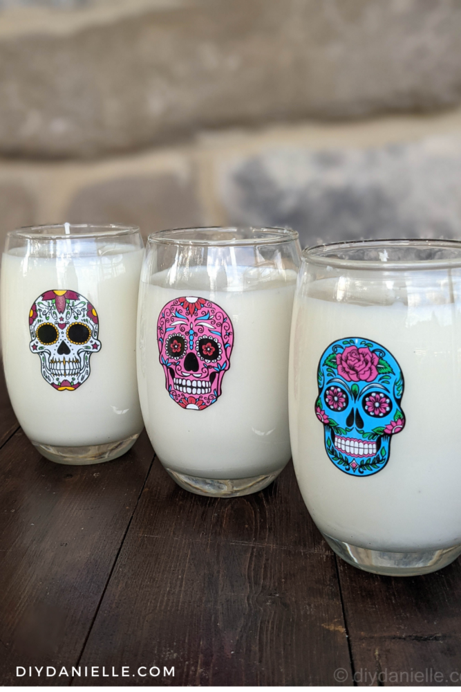 Soy candles that I made with Dollar Tree glasses for the Day of the Dead ofrenda.