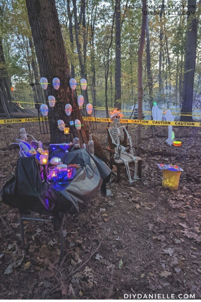 The Mad Lab in the daylight, including a skeleton sitting in the electric chair (colander on his head)