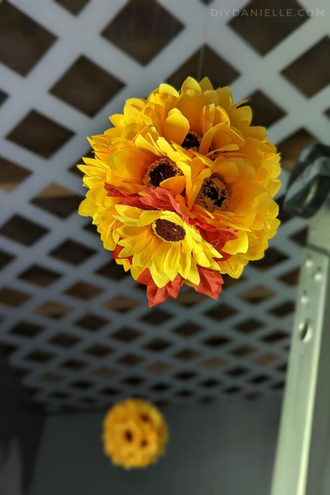 Sunflowers and fall leaves in a foam ball from Dollar Tree.