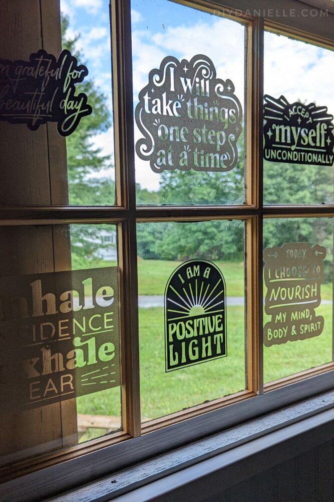 Affirmations stickers put on the window of the therapy office.