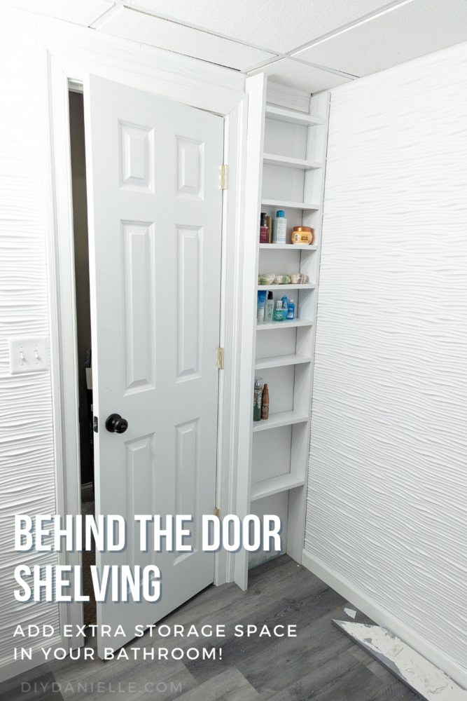 Behind the door shelving that we build for behind our basement bathroom door. This DIY shallow shelving is perfect for storing toilet paper and toiletries. 