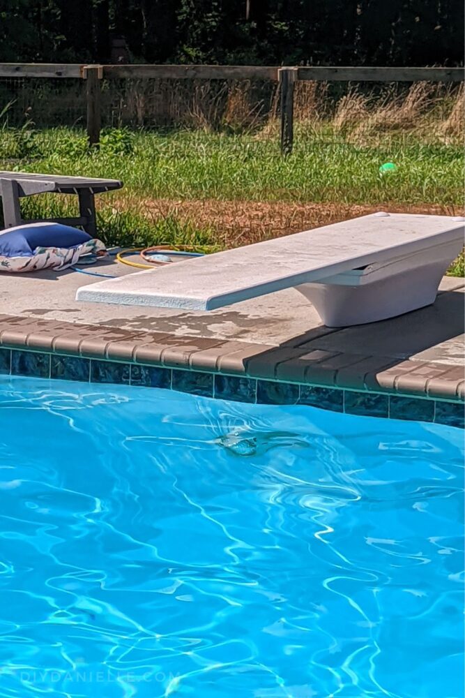 Photo of the diving board, which was installed at the very end of the pool construction process.