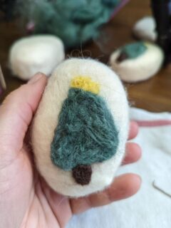 Felted Christmas Tree on a bar of soap done using both wet and dry felting process.
