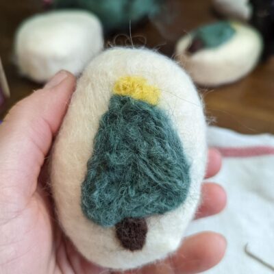 Felted Christmas Tree on a bar of soap done using both wet and dry felting process.