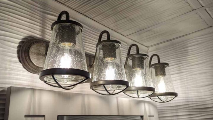 Image for Georgina 30 in. 4-Light Weathered Iron Industrial Bathroom Vanity Light with Clear Seeded Glass Shades