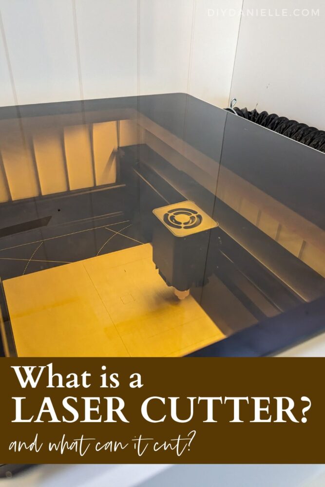 What is a laser cutter? What can it cut? Photo of a laser cutting machine engraving a piece of balsawood.