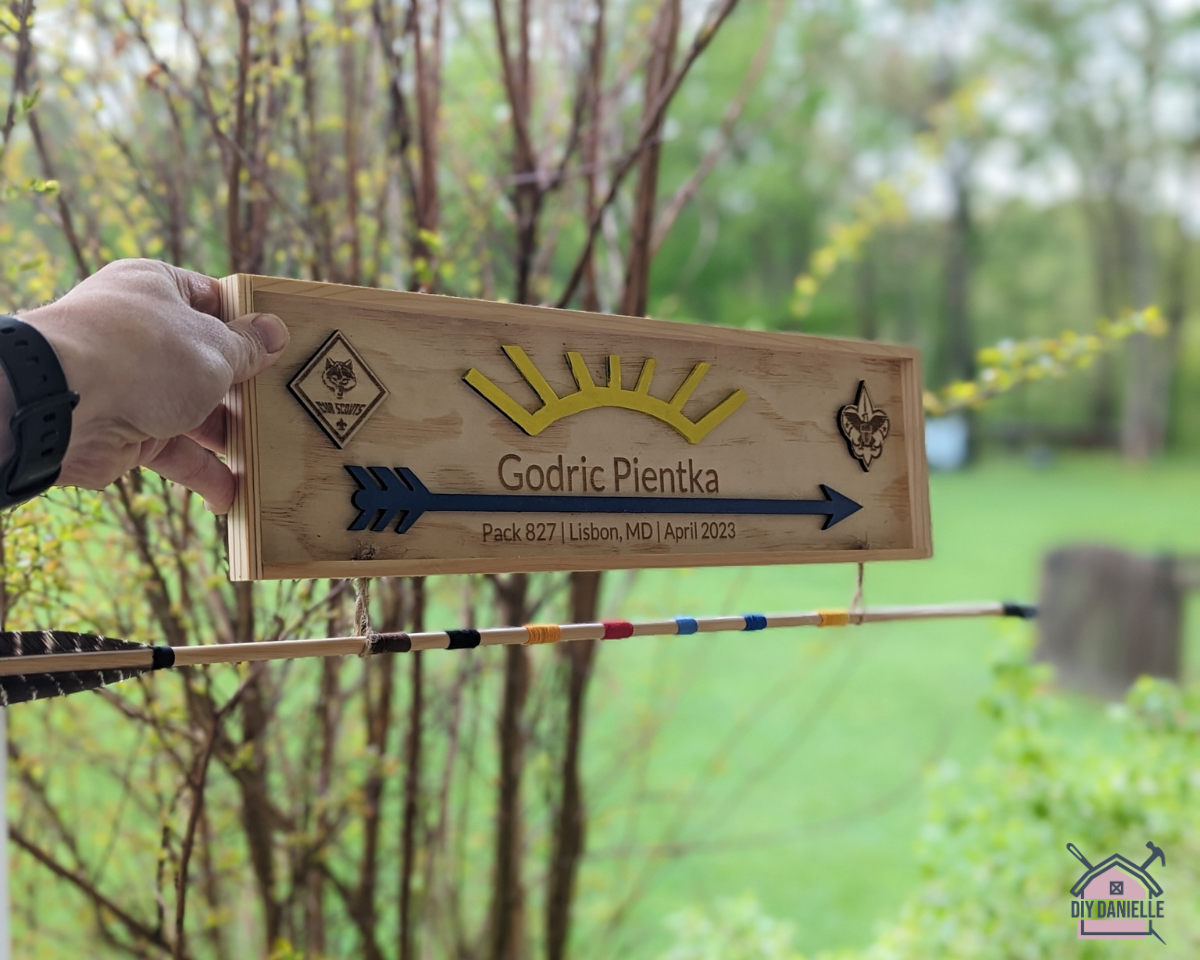 Photo of the Arrow of Light plaque that we made for my son's Scouts bridging ceremony. This was all laser cut!