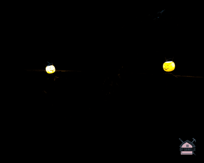 A completely pitch dark night and plastic pumpkins