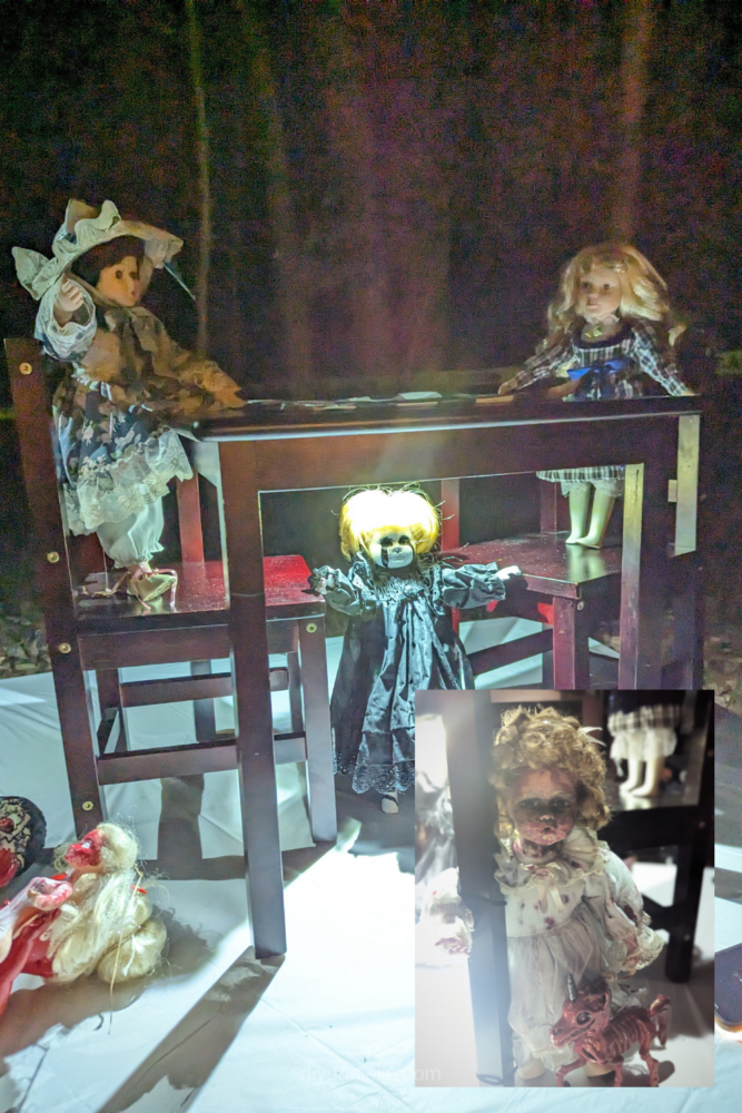Creepy doll tea party area at night