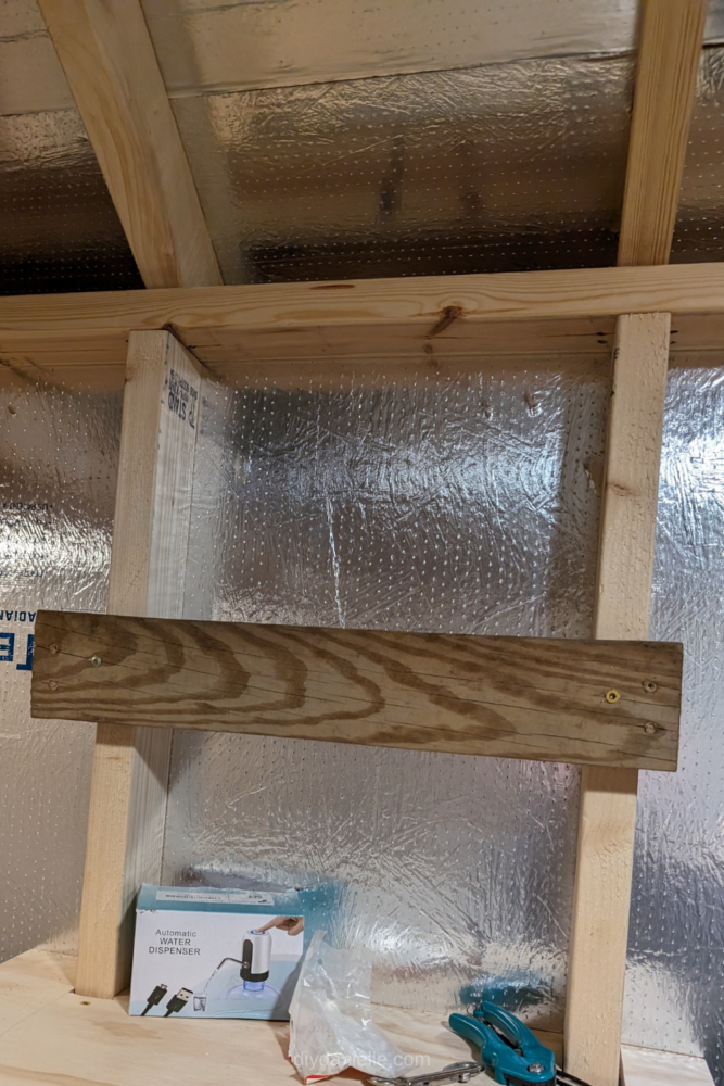 A 2x4 attached to the studs inside a shelf. This will support the shelf.
