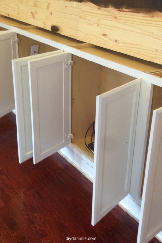 Cabinet doors with two coats of paint on them.