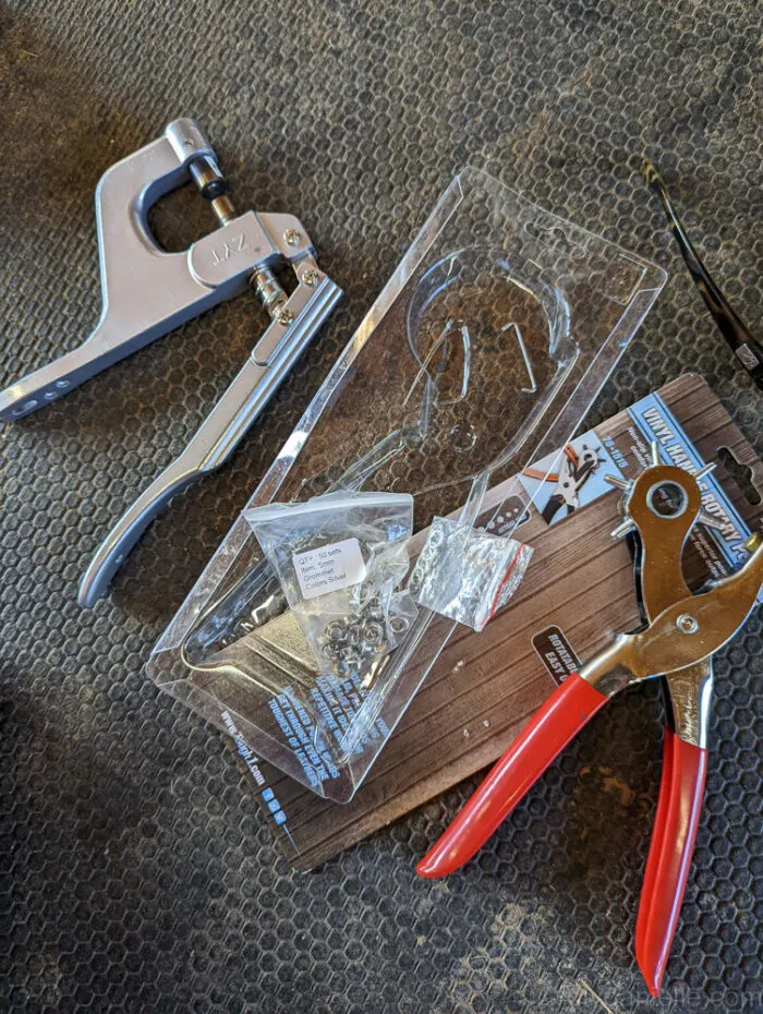 Supplies for DIY Tarp with Grommets:
Shown:
Grommets
Grommet Pliers
Rotary Hole Punch