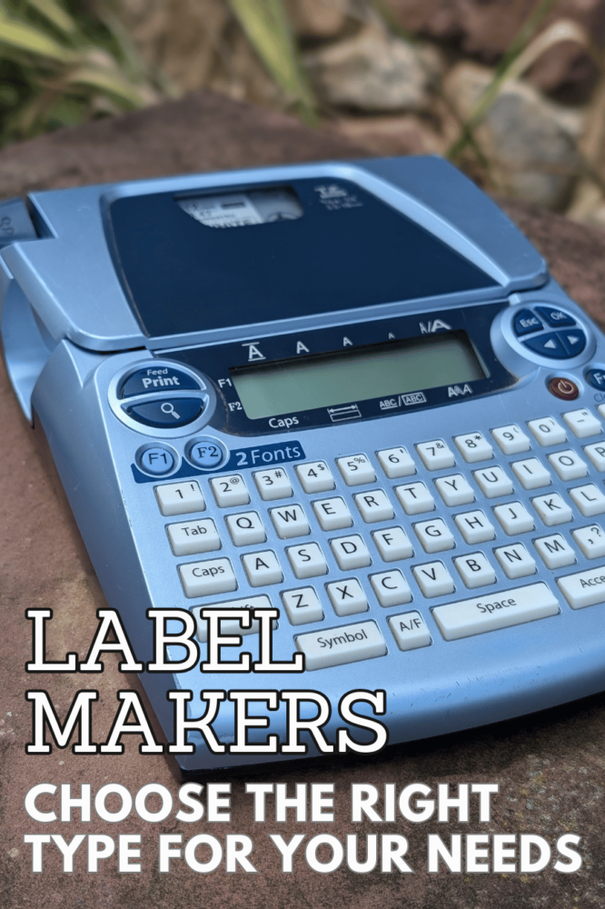 Label Makers: Choose the right type for your needs. Photo of a blue small portable label maker with a natural stone backdrop.