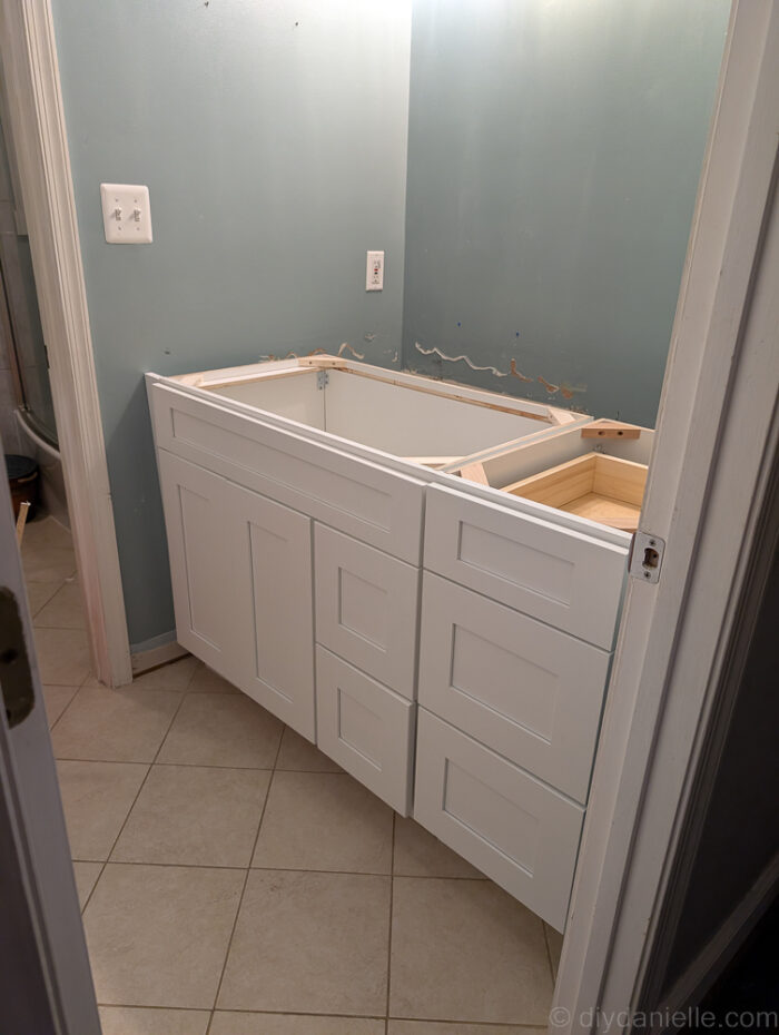 Aspen white shaker cabinets: base vanity 36" and 15" drawer vanity cabinet. 