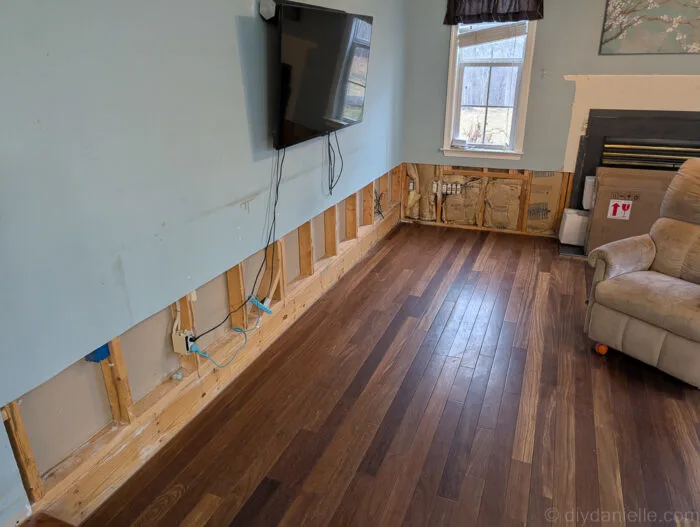 You can see in this photo that the wall under the TV doesn't have insulation. This is because it's a shared wall with our office. All of the other walls were exterior walls so they are insulated.