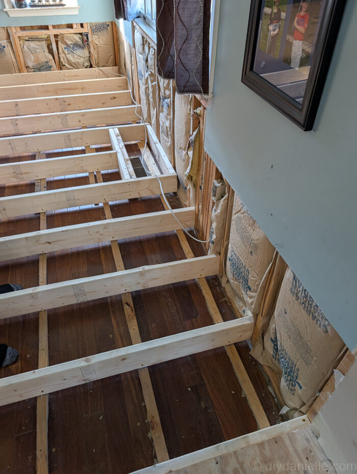 This photo is actually not accurate. They could have installed it like this but we had them go back and fix it because we wanted to ensure that there was a support beam all the way across that room. That will allow us to add a deck on the other side in the future without issues. 
