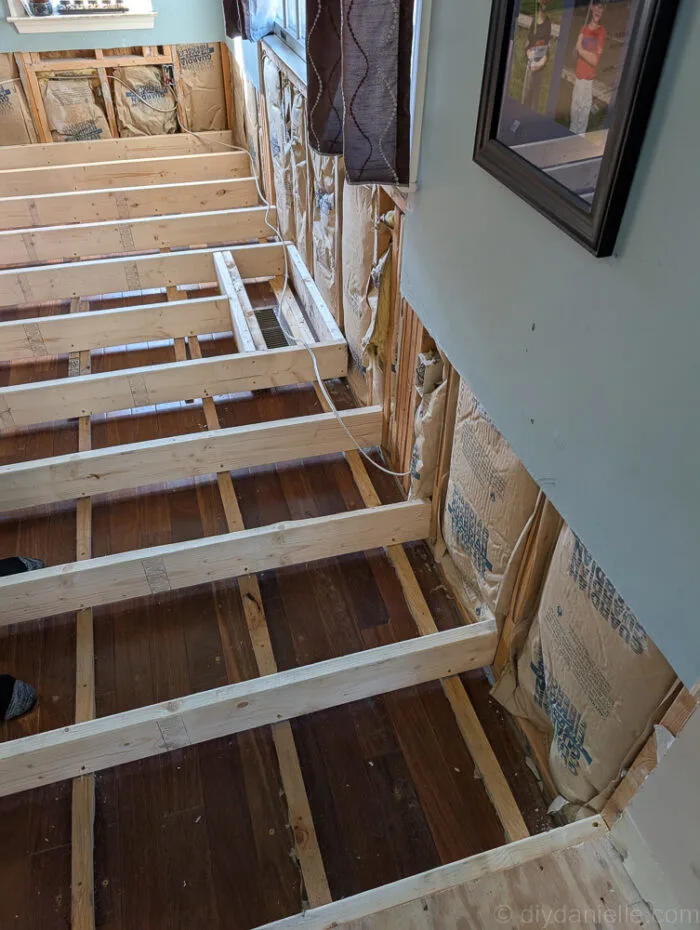 This photo is actually not accurate. They could have installed it like this but we had them go back and fix it because we wanted to ensure that there was a support beam all the way across that room. That will allow us to add a deck on the other side in the future without issues.