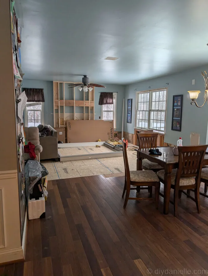 Original living room after the floor was raised and before the windows were removed.