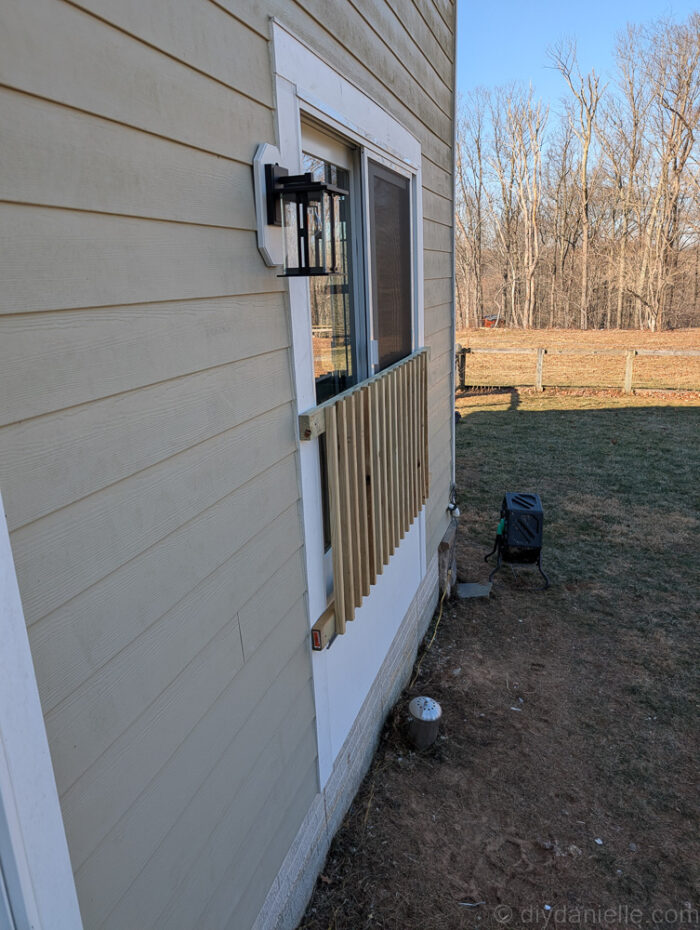 Temporary gate added to the sliding glass door. This will be replaced when we put a deck or stairs on.