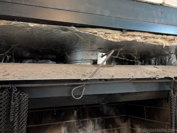 Fireplace before being closed off and insulated. Close up.