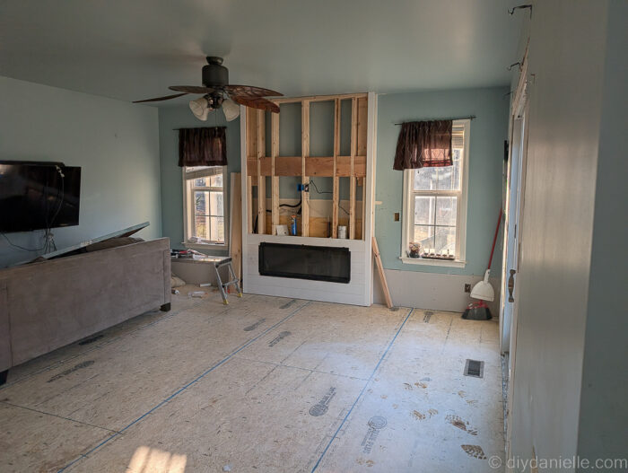Partially ship lapped fireplaced surround for an electric fireplace.