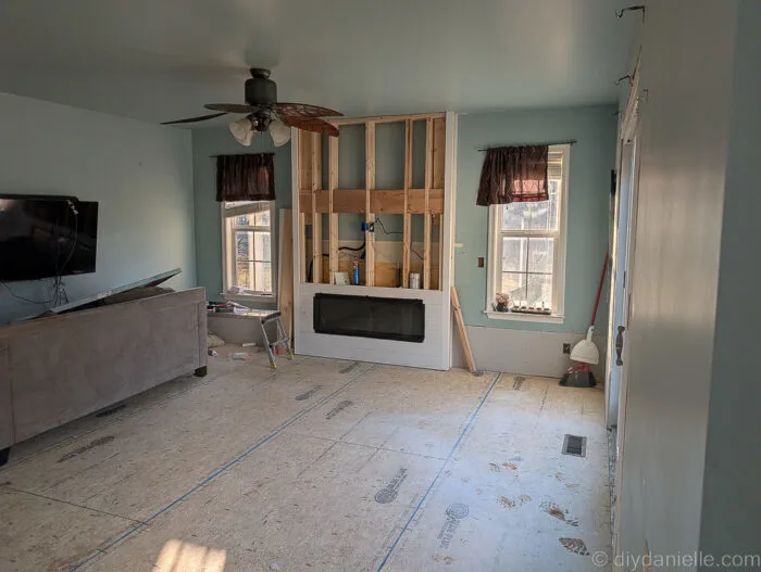 Partially ship lapped fireplaced surround for an electric fireplace.