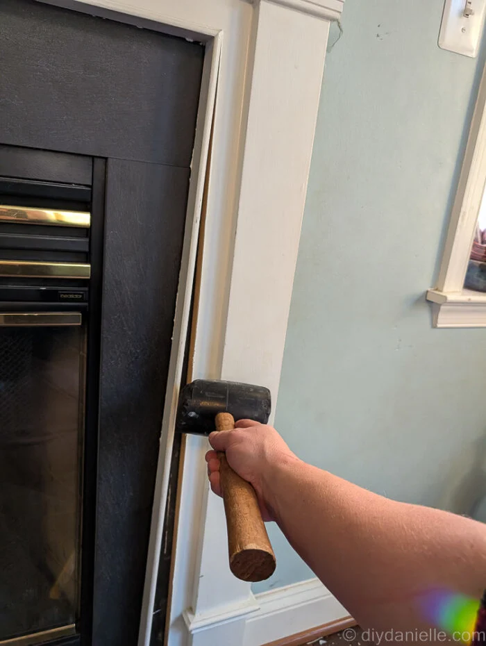 Hehe, demo! I'm removing trim using a mallet.