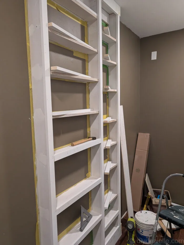 Patching compound applied to cover screw heads, pocket holes, and angled trim edges for a smooth, seamless look.
