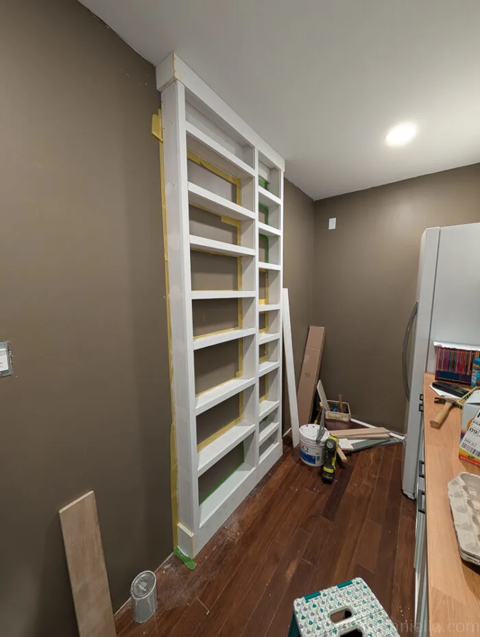 Sanded patching compound on shelves, ready for priming and painting with one or two coats for a smooth, flawless finish.