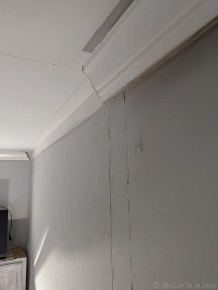 Old drywall marked for where we wanted to cut the drywall away to place our new divider wall and framing.