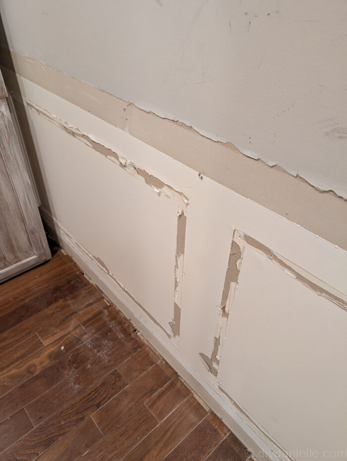 This wall was in the room and already drywalled. I had removed the trim. I needed to repair this... this was NOT for the weak of heart. My husband said after that he thinks it would have been easier to replace the drywall than to fix this all... I think he's correct. We had to scrape away all of the extra crap, then prime it all and the mudding process was EXTRA time consuming because there was more than just seams to cover. ZERO STARS. This is a photo of the wall before we fixed it... SO MUCH peeling paint and ripped drywall from the removal of baseboard and trim.