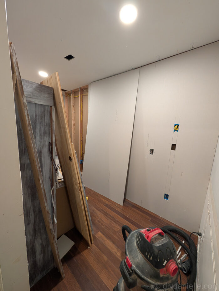Once the room was divided, we added drywall and electric, then mudded.
