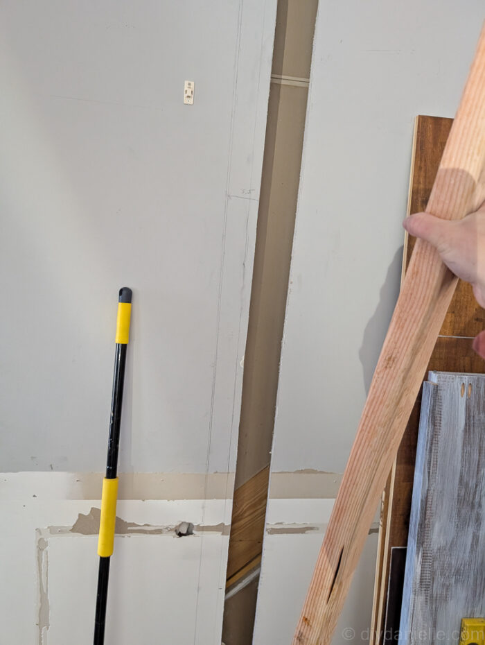 The side pieces for 2x4s need to be IN the wall and attached to the perpendicular wall's framing studs--- they cannot be attached through the drywall.